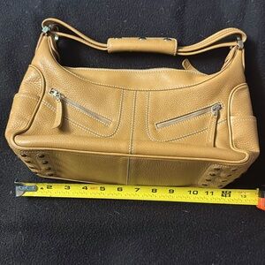 Leather handbag with strap